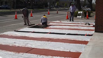 Concrete crew working on sidewalk in Orange County, CA.