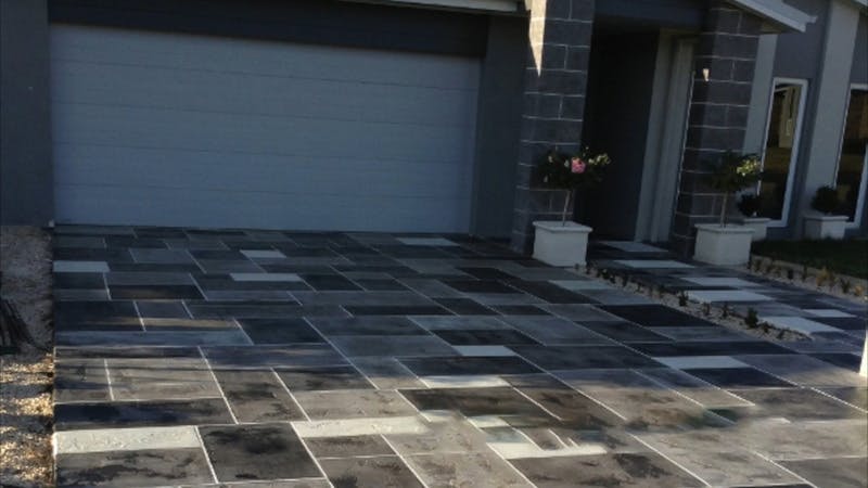 A new driveway with stamped concrete.