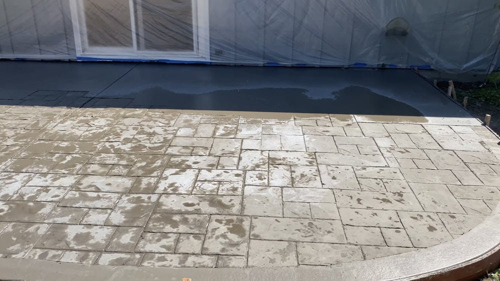 Stamped concrete floor in backyard of an Orange County house.